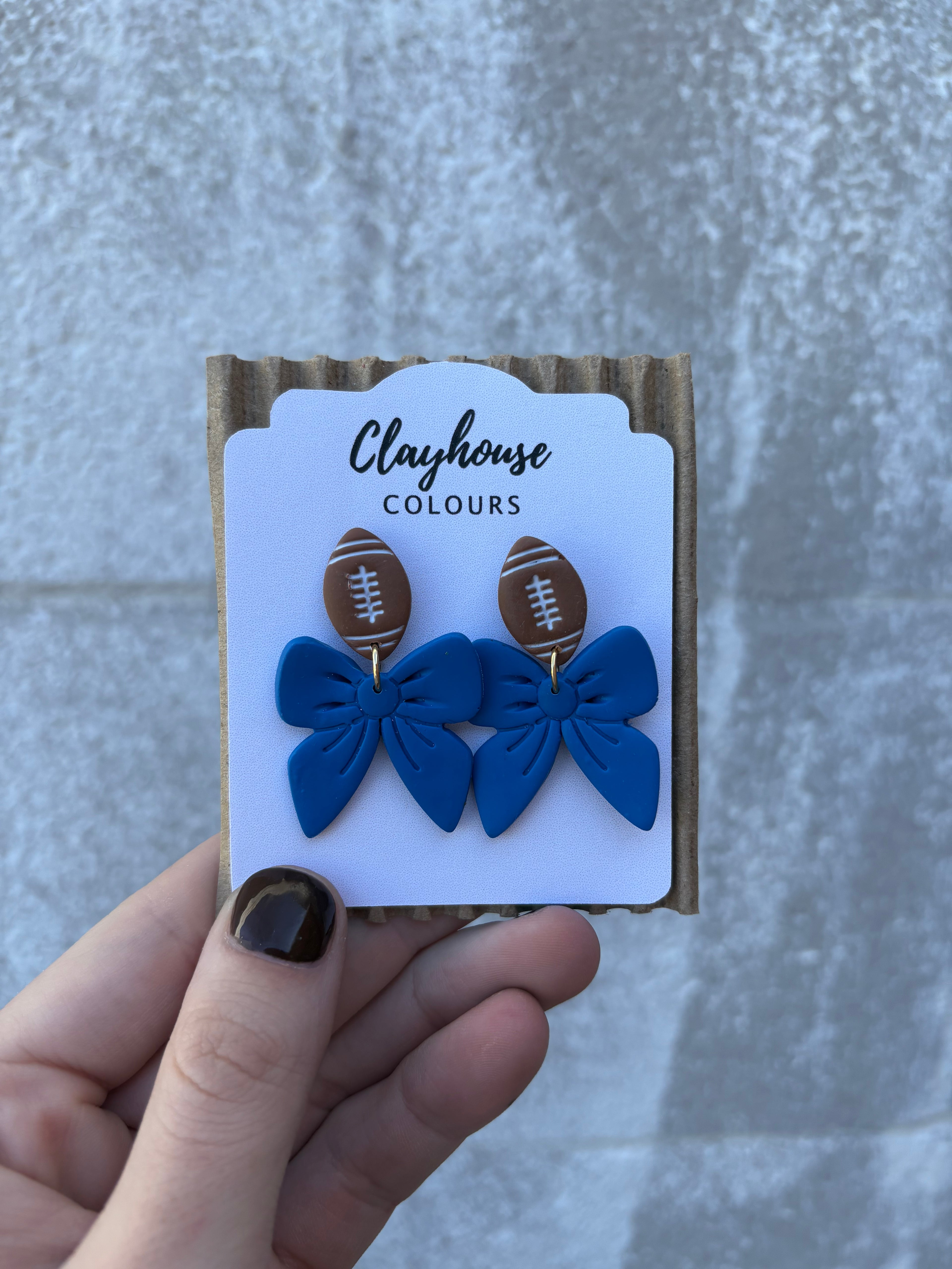 Blue Football Bow Earrings