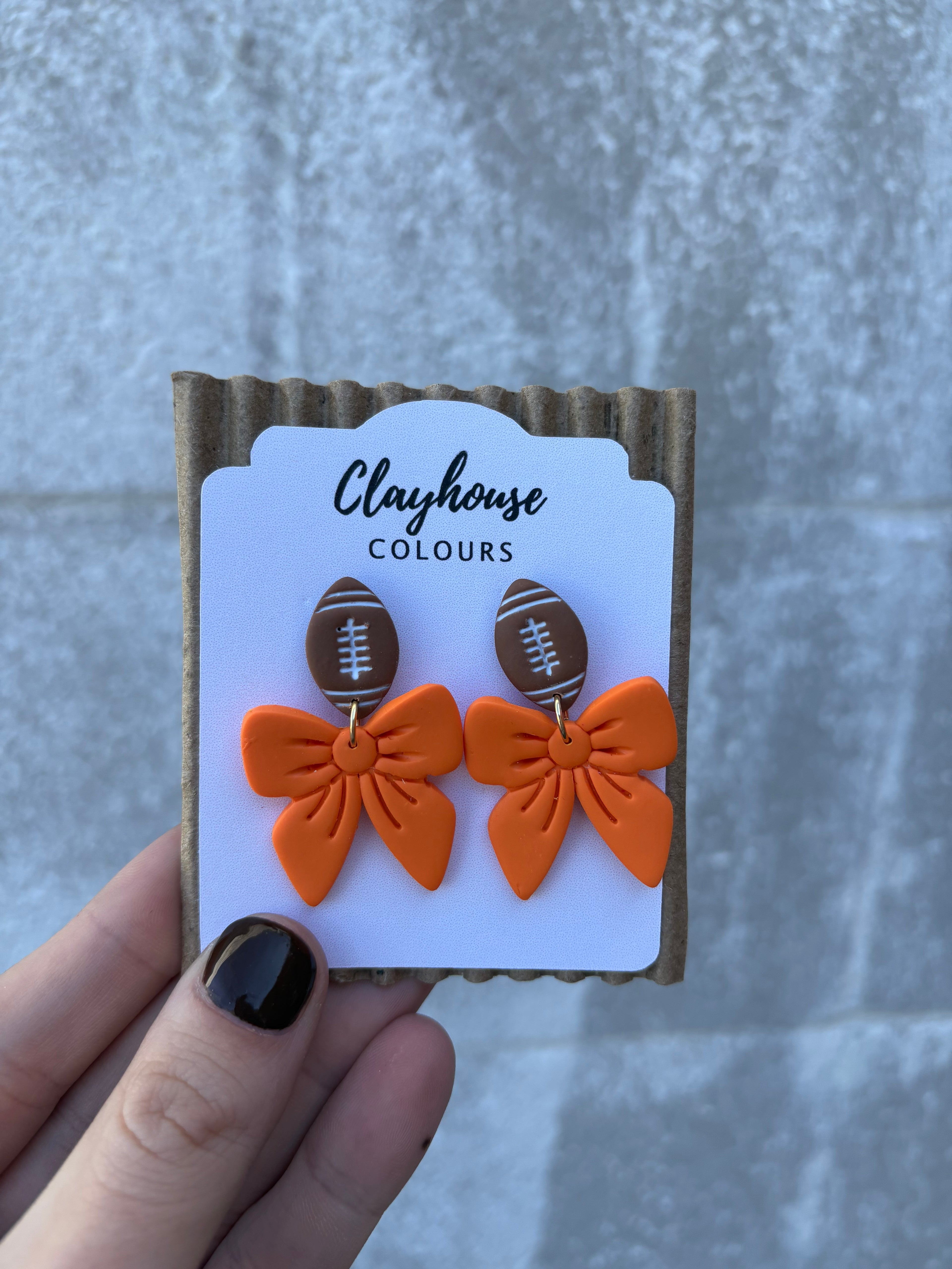 Orange Football Bow Earrings